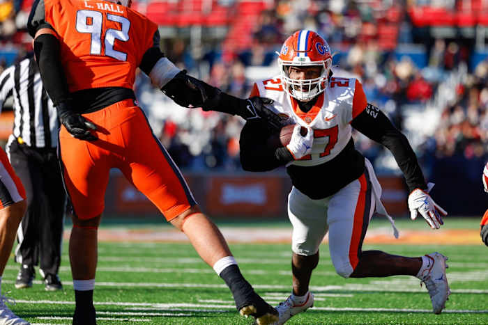 Feb 5, 2022; Mobile, AL, USA; American squad running back Dameon Pierce of Florida (27) runs with the ball in the second half against the National squad at Hancock Whitney Stadium.